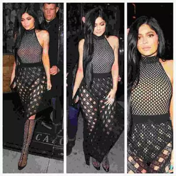 Kylie Jenner Steps Out In Fishnet Gown [Photos]